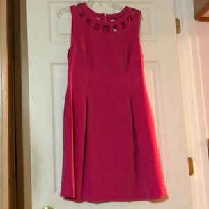 Pink dress with cut out around neck line
